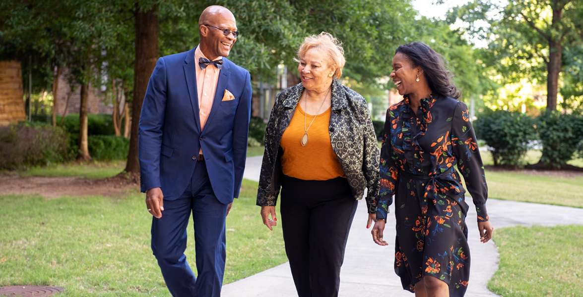 Smiling CDC HBCU Alumni walking together on the CDC campus