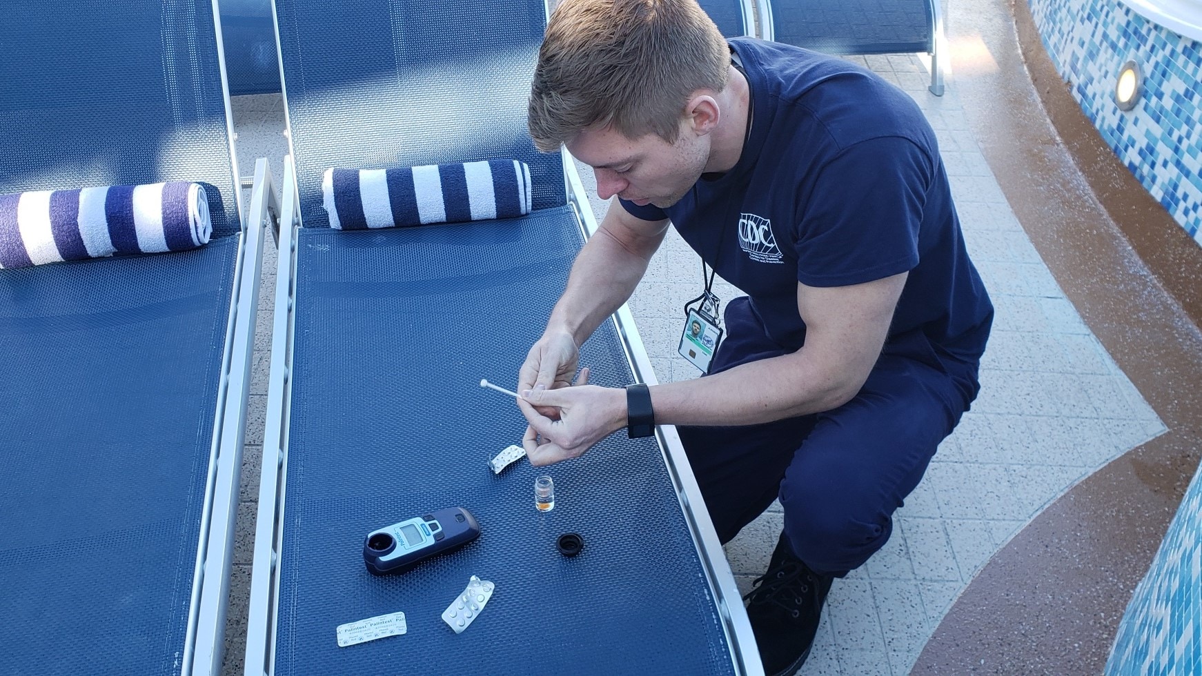 VSP inspector testing a sample of pool water.